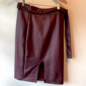 Vegan leather pencil skirt with sexy slit in the front.